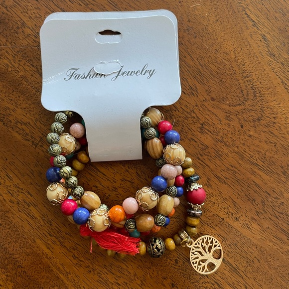 Stackable bracelets with cute little elephants and living trees. - Picture 4 of 6